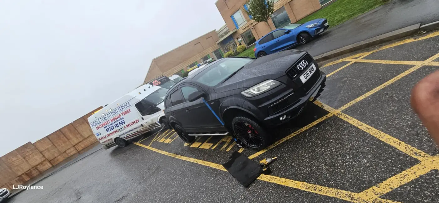 Southwest Mobile Tyres fitting a wheel on an Audi Q7 at the roadside