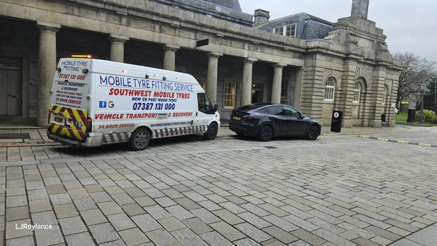 Southwest Mobile Tyres van fitting a tyre in Plymouth city centre